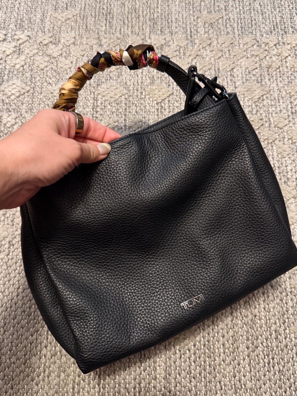 Tumi Black Pebbled Leather Shoulder Bag with Patterned Scarf-Wrapped Handle